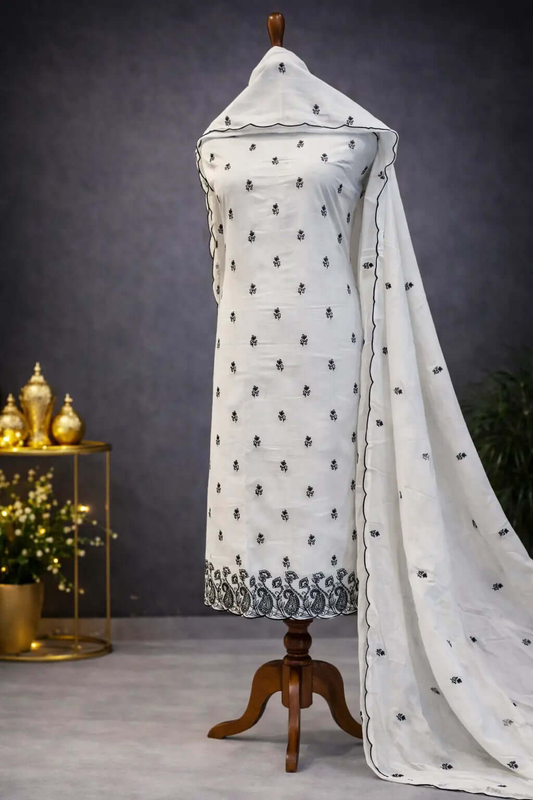 Ivory and black embroidered suit set with Scalloped Dupatta.