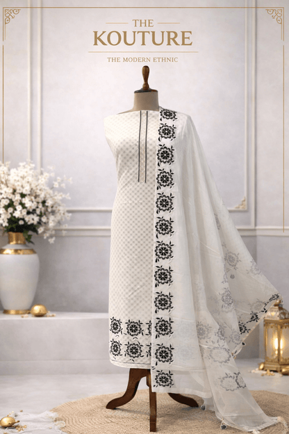Elegant ivory cotton suit set with Black Floral Embroidery & Dupatta – Elegant Ethnic Wear.