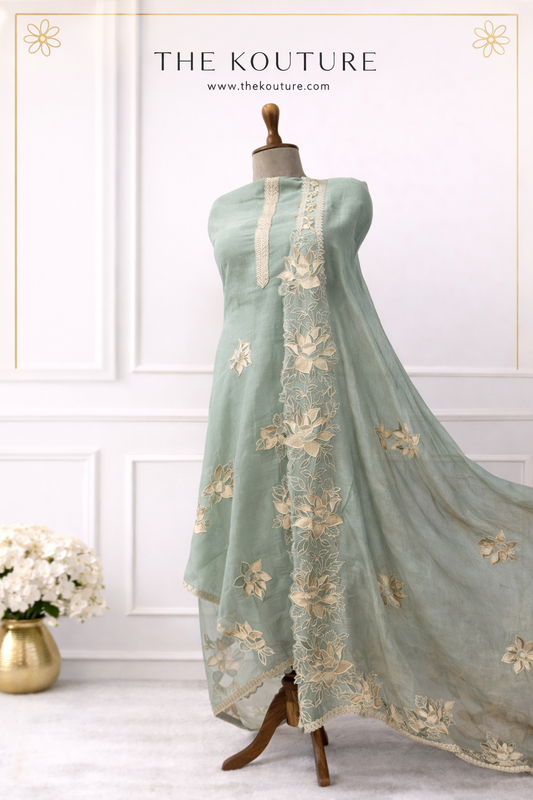 Mint green embroidered lawn suit with Dupatta.