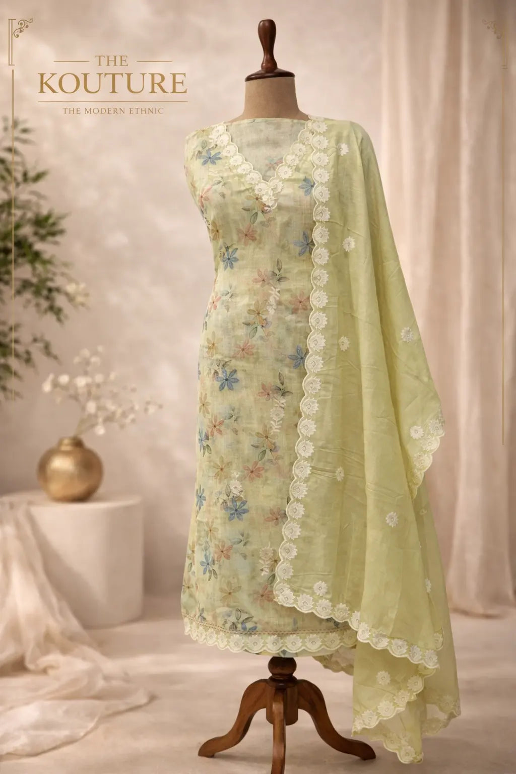 Pistachio green luxury suit set Floral Embroidered with Lace Dupatta displayed on mannequin in a stylish setting.