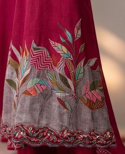 Rani pink embroidered muslin suit set with Botanical Applique & Printed Dupatta.